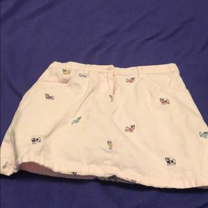 a pink puppy embroidered skirt (child)